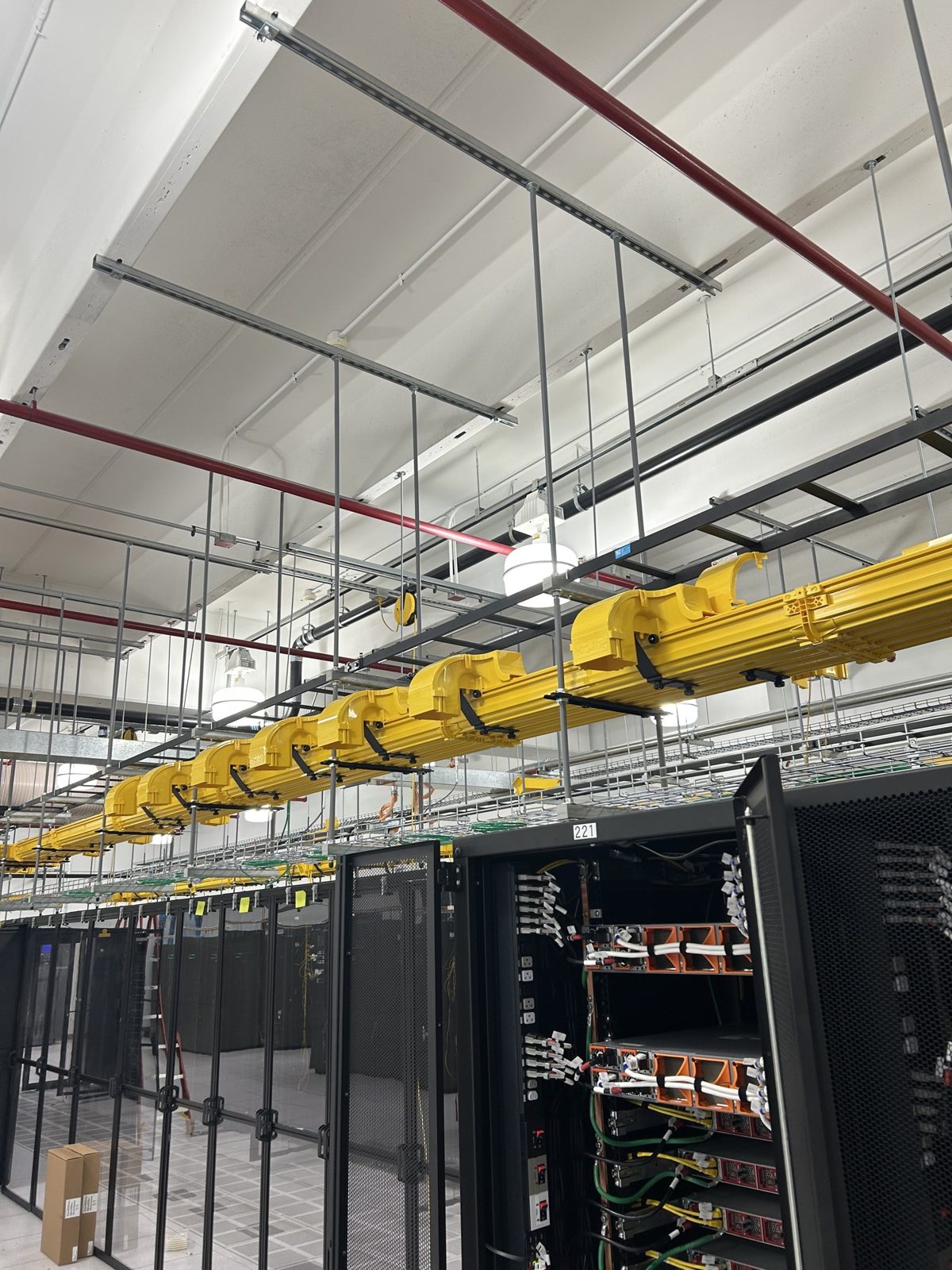 Fiber tray over the racks